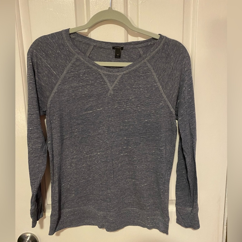 Heathered blue long sleeved tee.